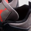 H12 UNDEFEATED X AIR JORDAN 4 RETRO OLIVE-OILED_WHITE