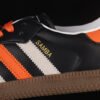 SAMBA VEGAN SHOES CORE BLACK_ORANGE_CLOUD WHITE