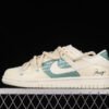 DUNK LOW SB ESS COCONUT MILK_WHITE_SAIL