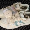 DUNK LOW SB ESS COCONUT MILK_WHITE_SAIL